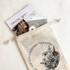 Dear Mushka care bag with thank you card, cleaning cloth, and mint