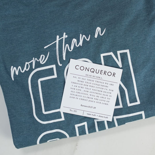 CONQUEROR TEE · ROMANS 8:37-39