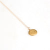 Small gold locket necklace