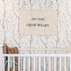 Do Not Grow Weary Endurance Flag hanging above nursery crib