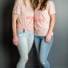 Two women in pink abide t shirts