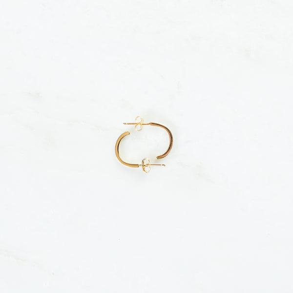 Gold half hoop Progress earrings