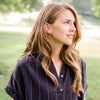 Woman wearing Tortoise shell acetate hoop earrings