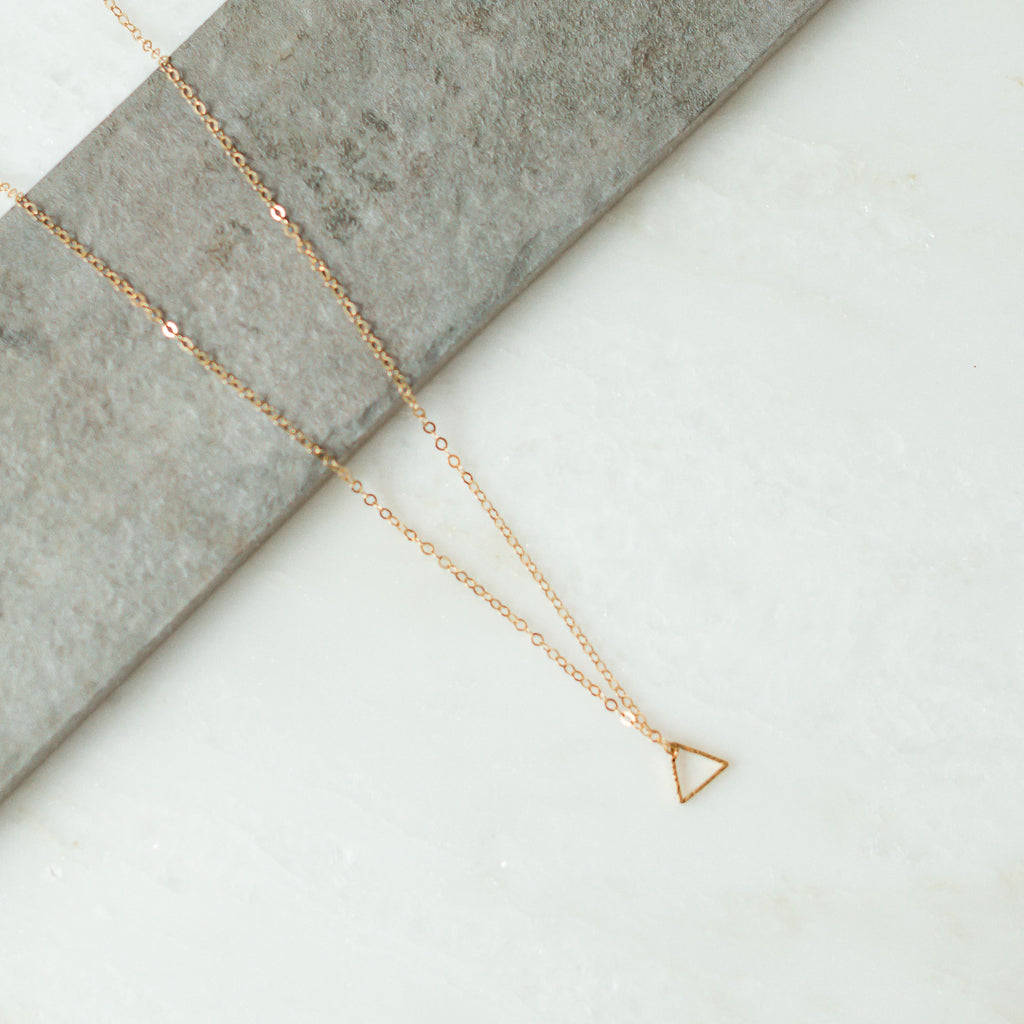 Verb gold triangle necklace