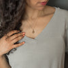 Woman wearing Honey druzy stone gold necklace