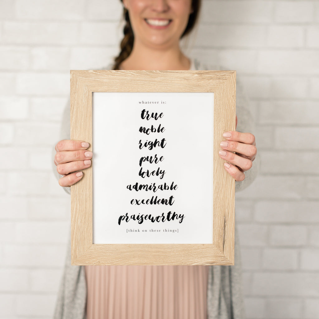 Woman holding Philippians art print framed