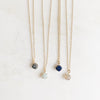 Guide stone and gold necklaces, grey, charcoal, mint, and navy