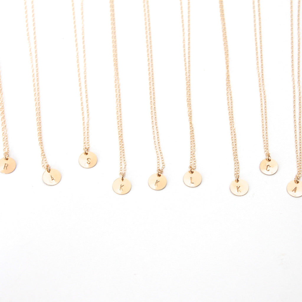 Gold called initial necklaces