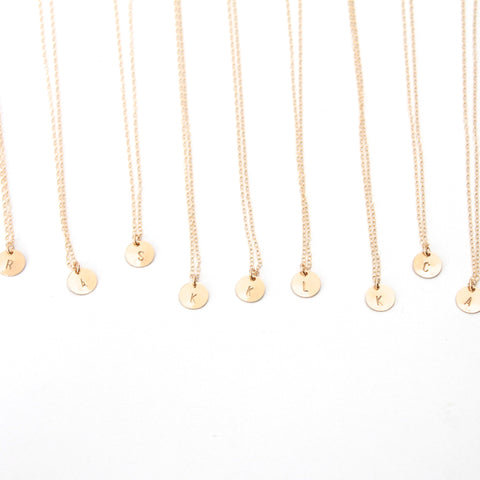 Gold called initial necklaces